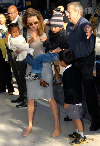 Illustration for article titled Angelina Jolie's "Peanuts" Gallery Of Back-To-School Outfits